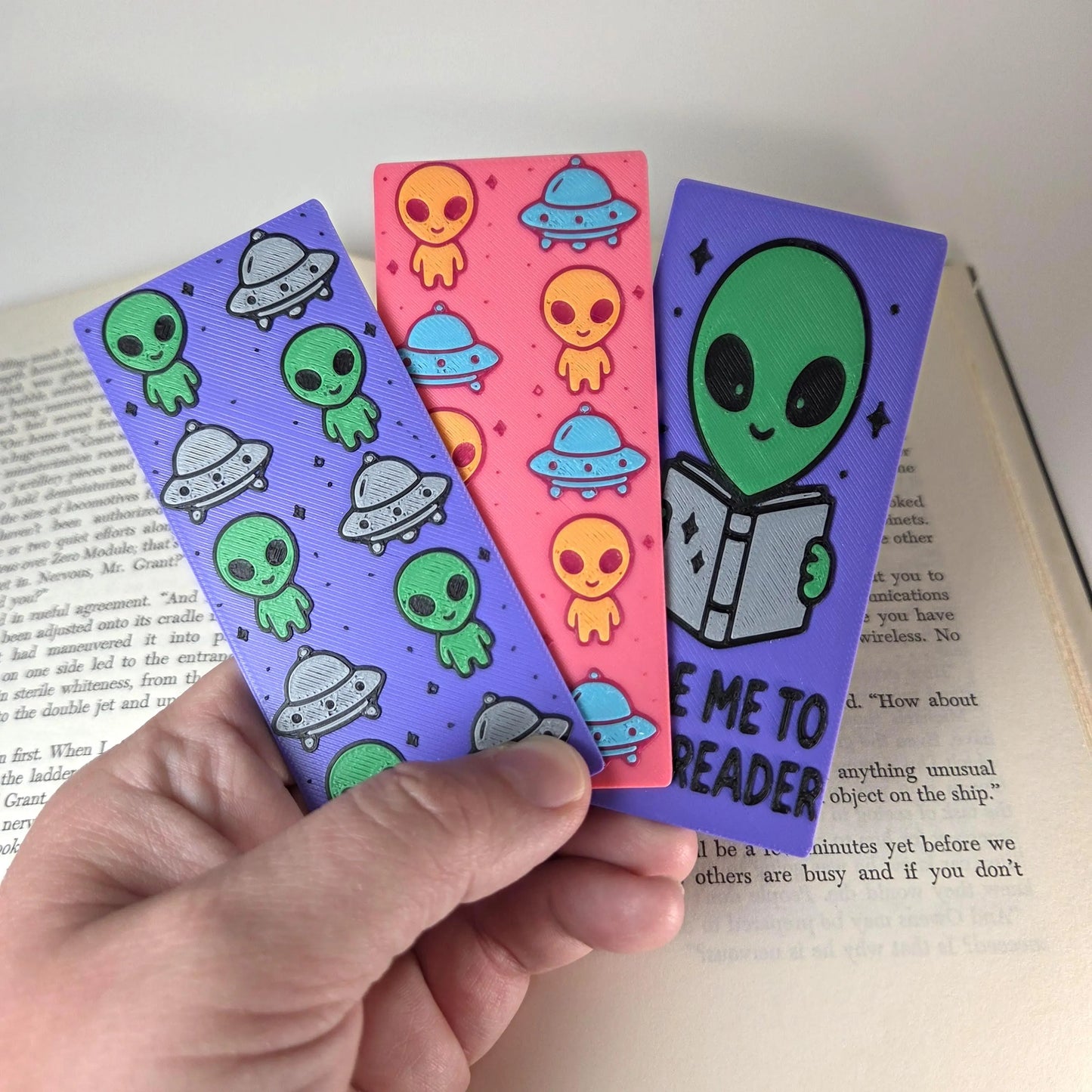 Alien "Take Me to Your Reader.” Bookmark