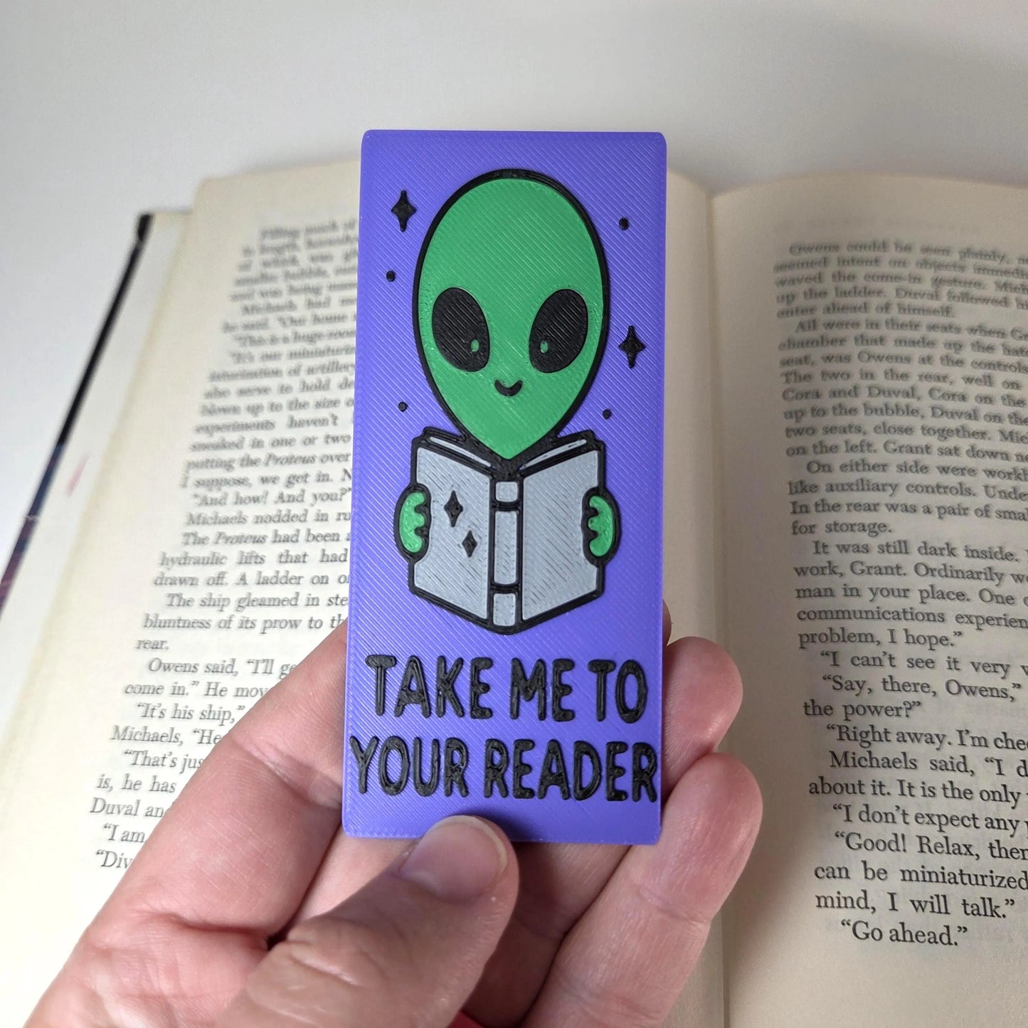 Alien "Take Me to Your Reader.” Bookmark