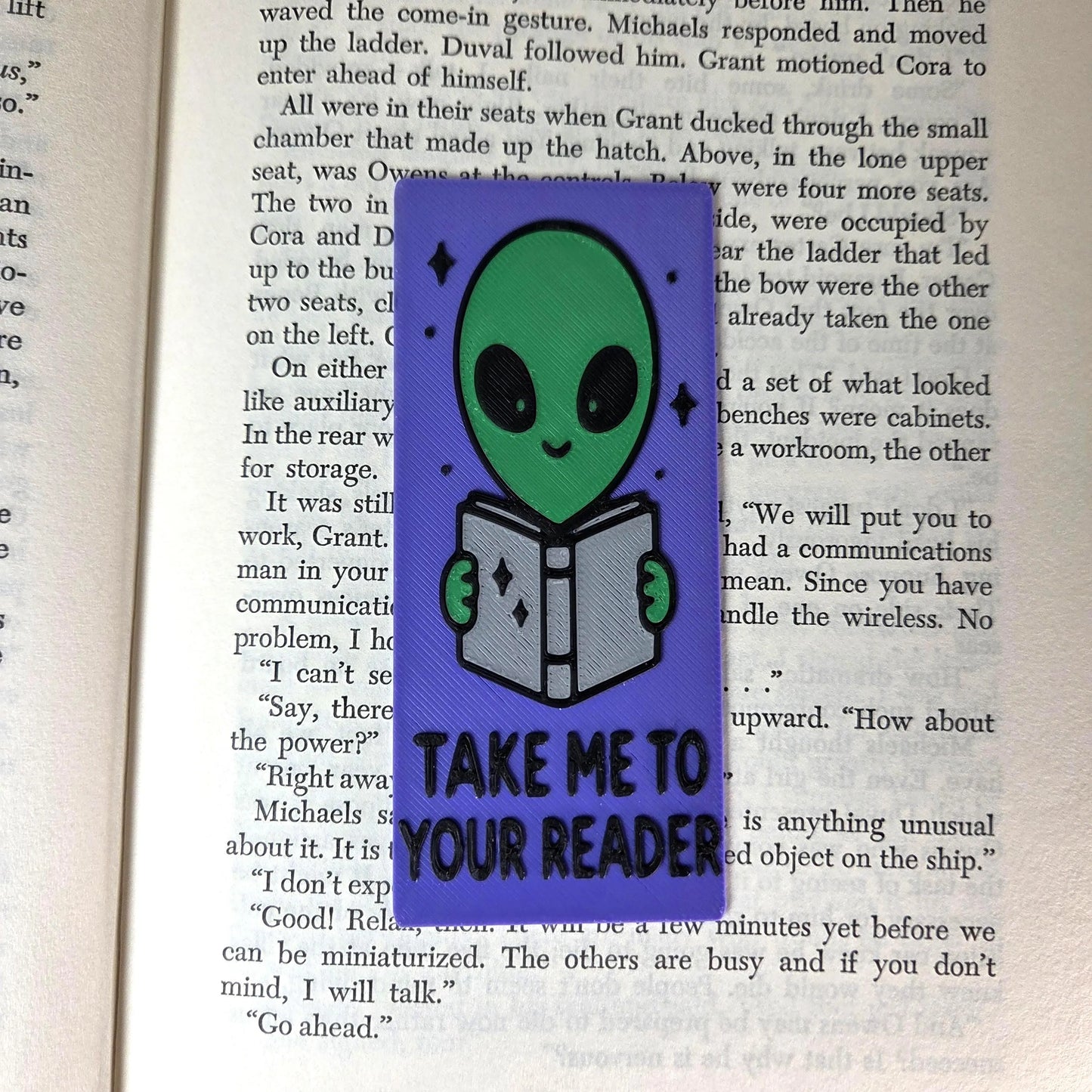 Alien "Take Me to Your Reader.” Bookmark
