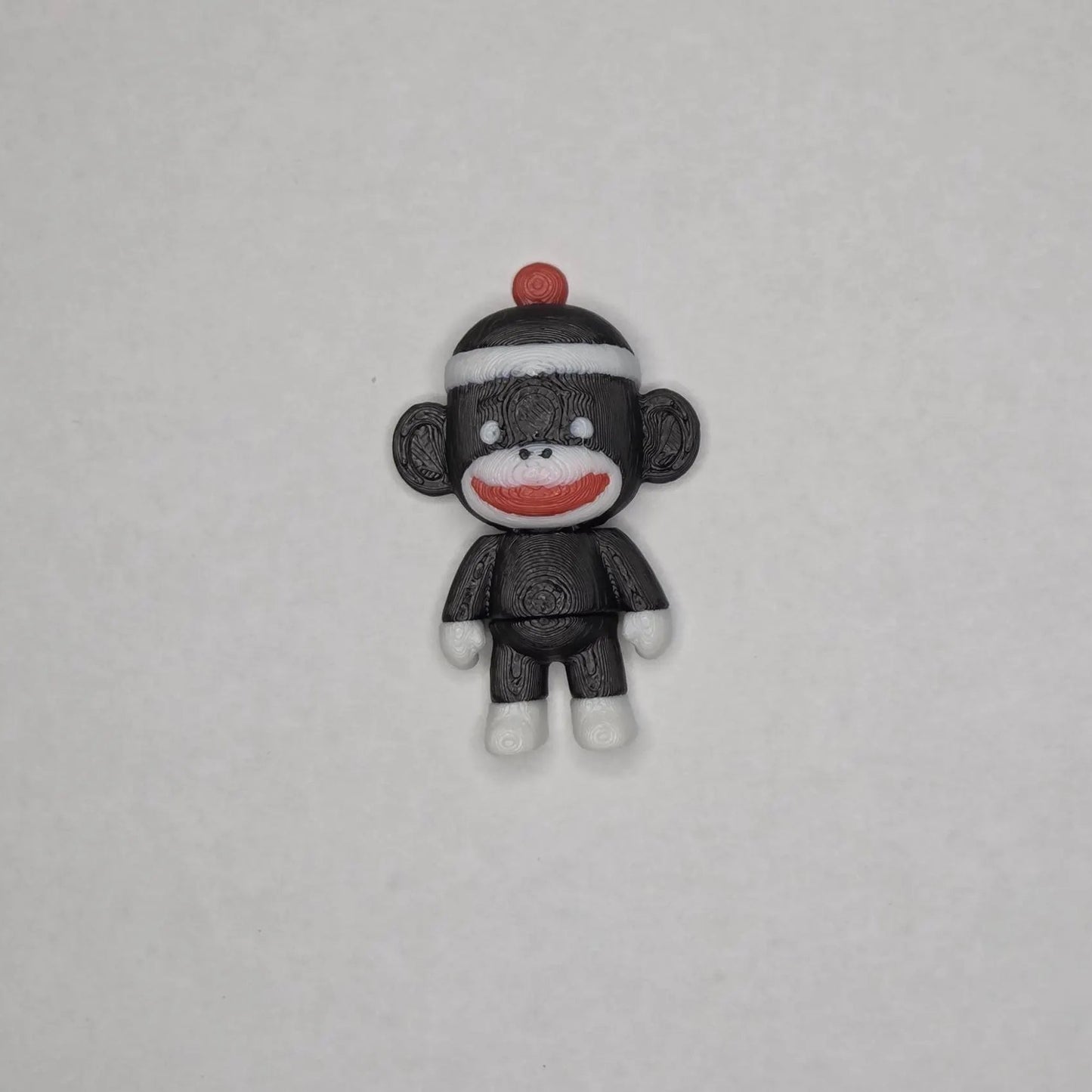 Mini Sock Monkey Flexi Toy